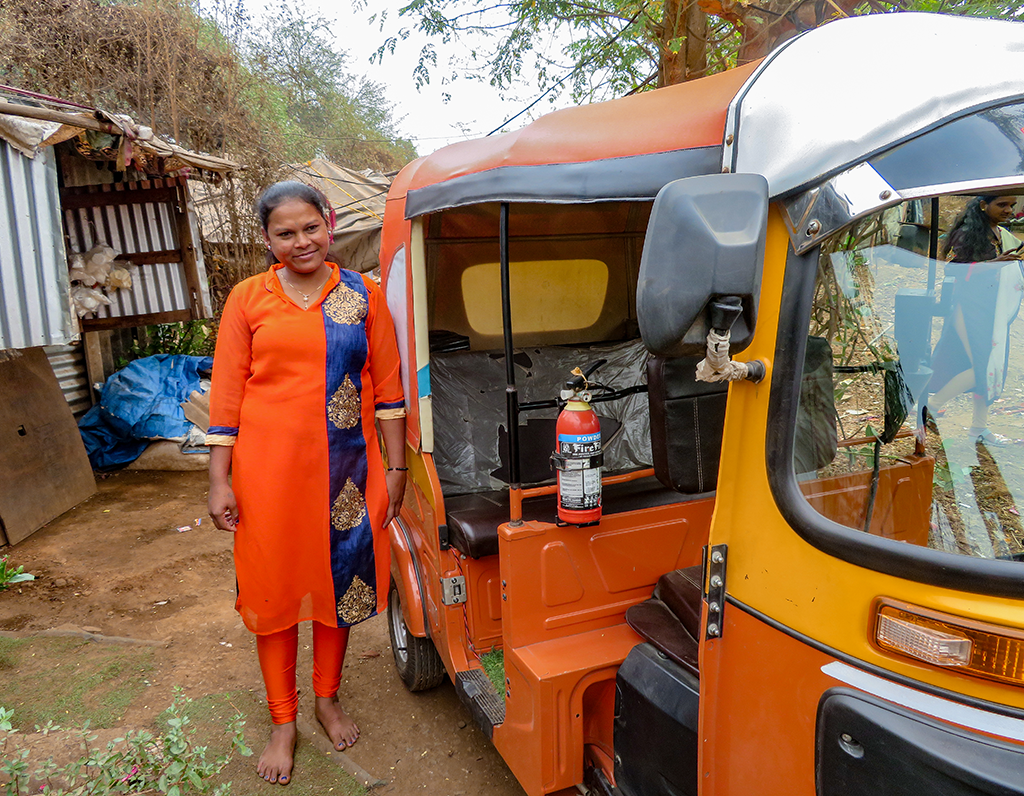 Laksmi and Her Orange Rickshaw